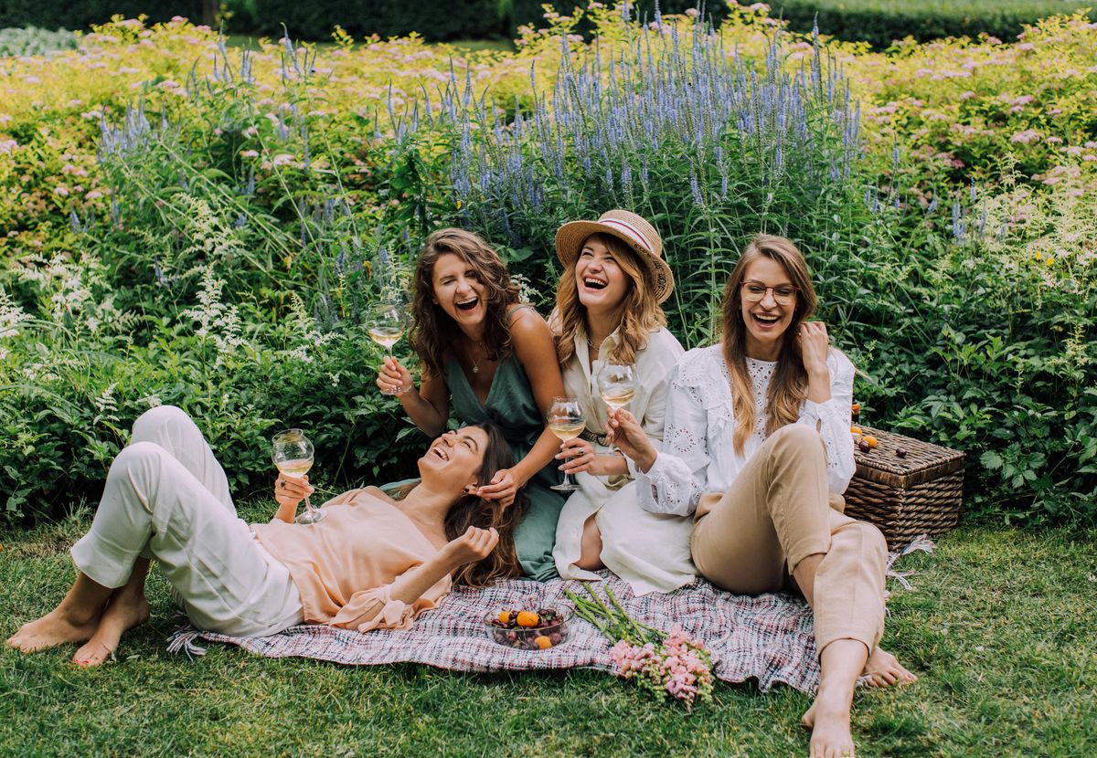 women sitting in circle laughing